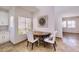 A lovely nook with decorative art adjacent to an eat-in kitchen at 11333 N 92Nd St # 1118, Scottsdale, AZ 85260