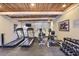 Well-equipped home gym featuring treadmills, weights, and exercise machines for a healthy lifestyle at 11333 N 92Nd St # 1118, Scottsdale, AZ 85260
