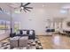 A spacious living room with high ceilings, modern decor, and an open floor plan to the dining area at 11333 N 92Nd St # 1118, Scottsdale, AZ 85260