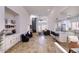 Open-concept living area featuring modern furniture, a breakfast bar, and seamlessly flowing layout at 11333 N 92Nd St # 1118, Scottsdale, AZ 85260