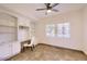 Home office featuring built-in shelves and natural light, designed to maximize comfort and productivity at 11333 N 92Nd St # 1118, Scottsdale, AZ 85260