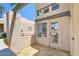 Private outdoor patio with neutral toned pavers and covered area at 11333 N 92Nd St # 1118, Scottsdale, AZ 85260