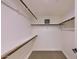 Spacious walk-in closet with shelf and rail storage, offering ample space at 11333 N 92Nd St # 1118, Scottsdale, AZ 85260