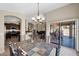 Open dining area leading to the kitchen and outdoor patio, perfect for entertaining at 1144 E Nunneley Rd, Gilbert, AZ 85296