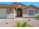 Well-maintained home featuring desert landscaping, a neatly kept yard, and a welcoming entryway at 1144 E Nunneley Rd, Gilbert, AZ 85296