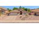 Charming single-story home with a well-manicured front yard, desert landscaping, and a two-car garage at 1144 E Nunneley Rd, Gilbert, AZ 85296