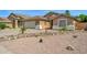 Charming home featuring a well-kept yard and a spacious two-car garage at 1144 E Nunneley Rd, Gilbert, AZ 85296