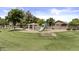 Community playground with a covered picnic area and ample green space at 1144 E Nunneley Rd, Gilbert, AZ 85296