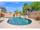 Sparkling swimming pool surrounded by a well-maintained backyard oasis at 1144 E Nunneley Rd, Gilbert, AZ 85296