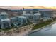 Breathtaking aerial view of modern residential buildings near a serene lake and lush green landscape at 120 E Rio Salado E Pkwy # 102, Tempe, AZ 85281