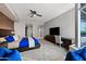 Bright and spacious bedroom with a large window, desk, and accent wall, providing a relaxing and productive atmosphere at 120 E Rio Salado E Pkwy # 102, Tempe, AZ 85281
