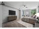 Bedroom features a comfortable bed, a stylish console, and a large window that offers pleasant views at 120 E Rio Salado E Pkwy # 102, Tempe, AZ 85281