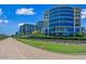 Lush greenery surrounds modern residential buildings, enhancing the property's curb appeal and serene environment at 120 E Rio Salado E Pkwy # 102, Tempe, AZ 85281