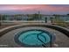 Relaxing community hot tub with lake views, perfect for unwinding after a long day at 120 E Rio Salado E Pkwy # 102, Tempe, AZ 85281