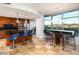 Gourmet kitchen features sleek countertops, custom cabinetry, and an adjacent breakfast bar with comfortable seating at 120 E Rio Salado E Pkwy # 102, Tempe, AZ 85281