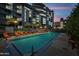 A long and inviting community swimming pool with chairs for lounging at 120 E Rio Salado E Pkwy # 102, Tempe, AZ 85281