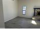 Bright living room featuring a fireplace and tile floors at 121 N Brown Ave, Casa Grande, AZ 85122