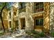 Charming condo with multiple balconies, complemented by a small landscaped front yard at 121 N California St # 35, Chandler, AZ 85225