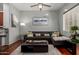 Comfortable living room with an open layout, hardwood floors, neutral decor, and a modern aesthetic at 121 N California St # 35, Chandler, AZ 85225