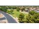 An aerial view of a lush neighborhood park with mature trees in a well-maintained community at 1282 N Banning St, Gilbert, AZ 85234
