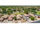 Aerial view showcases neighborhood with mature landscaping, swimming pools, and easy access to community green spaces at 1282 N Banning St, Gilbert, AZ 85234