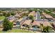 Aerial view showcasing community with pools, well-manicured lawns, and mature trees at 1282 N Banning St, Gilbert, AZ 85234