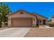 Charming single-story home featuring a two-car garage and well-maintained landscaping at 1282 N Banning St, Gilbert, AZ 85234