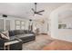 Inviting living room with wood floors, a comfortable sectional, and stylish decor at 1282 N Banning St, Gilbert, AZ 85234