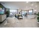 Open-concept living and dining area with modern decor and plenty of natural light at 13195 N 145Th Ln, Surprise, AZ 85379
