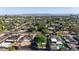 Picturesque neighborhood view with diverse rooftops, lush trees, and scenic mountain backdrop at 1338 E Granada Rd, Phoenix, AZ 85006