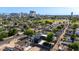 View of the neighborhood featuring mature trees, nearby city buildings, and a mix of residential homes at 1338 E Granada Rd, Phoenix, AZ 85006