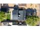 Bird's-eye view of the house featuring solar panels, a modern yard, and a driveway at 1338 E Granada Rd, Phoenix, AZ 85006
