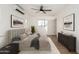 Inviting bedroom featuring contemporary decor, a mini-split AC unit, and plenty of natural light from the windows at 1338 E Granada Rd, Phoenix, AZ 85006