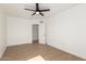 Well-lit bedroom featuring luxury vinyl plank flooring and a modern ceiling fan at 1338 E Granada Rd, Phoenix, AZ 85006