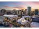 A dynamic cityscape during sunset, highlighting architectural diversity and urban vitality at 1338 E Granada Rd, Phoenix, AZ 85006