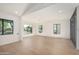 Spacious living room with plenty of natural light from large windows and an open floor plan to make the space feel larger at 1338 E Granada Rd, Phoenix, AZ 85006