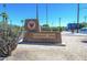 Coronado Park sign surrounded by desert landscape, inviting visitors to enjoy a tranquil urban oasis at 1338 E Granada Rd, Phoenix, AZ 85006