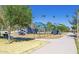 Modern playground with blue canopies and a variety of play structures, promoting outdoor fun at 1338 E Granada Rd, Phoenix, AZ 85006
