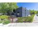 Stylish restaurant with a modern black exterior, outdoor seating and lush landscaping at 1338 E Granada Rd, Phoenix, AZ 85006