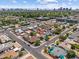 Panoramic aerial view showcasing a home's location within a vibrant city, with parks and roadways nearby at 1367 E Mitchell Dr, Phoenix, AZ 85014
