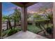 Serene backyard with manicured lawn, privacy landscaping and scenic mountain views at 14598 E Corrine Dr, Scottsdale, AZ 85259
