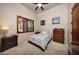 Cozy bedroom with natural light, neutral color palette, and comfortable furnishings at 14598 E Corrine Dr, Scottsdale, AZ 85259
