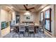 Formal dining room with a large table, elegant chairs, shutters, and stylish decor perfect for hosting gatherings at 14598 E Corrine Dr, Scottsdale, AZ 85259