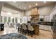 Gourmet kitchen featuring a large island, custom cabinetry, and high-end appliances, perfect for cooking and entertaining at 14598 E Corrine Dr, Scottsdale, AZ 85259