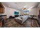 Basement Gathering room with wet bar, oversized sectional and large windows at 14598 E Corrine Dr, Scottsdale, AZ 85259