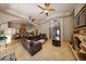 Expansive living room open to the kitchen, featuring abundant natural light, and a seamless flow for easy entertaining at 14598 E Corrine Dr, Scottsdale, AZ 85259
