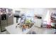 Bright kitchen features white cabinets and stainless steel refrigerator at 16251 N 91St Dr, Peoria, AZ 85382