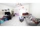 Cozy living room with neutral paint and tile flooring at 16251 N 91St Dr, Peoria, AZ 85382