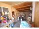 This storage room or shed has an unfinished ceiling, concrete floors and walls at 16251 N 91St Dr, Peoria, AZ 85382