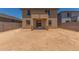 An expansive backyard with block fence, ready to be landscaped for outdoor living and entertainment at 18351 W Patrick Ln, Surprise, AZ 85387